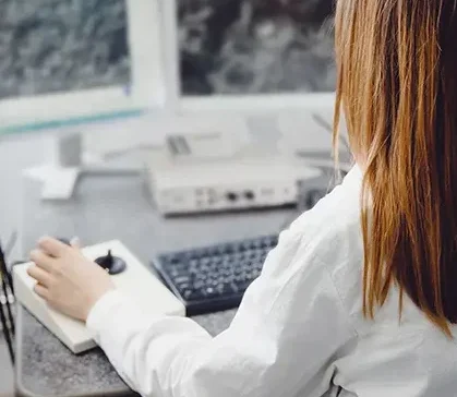 woman working on control desk