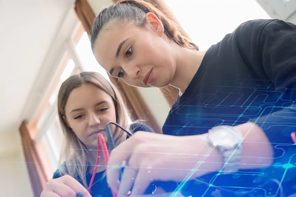 Two young students in technical vocational training