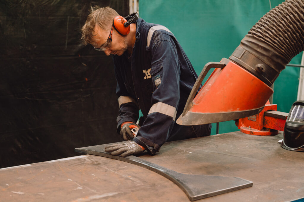 Engineer working on sheet metal fabrication.